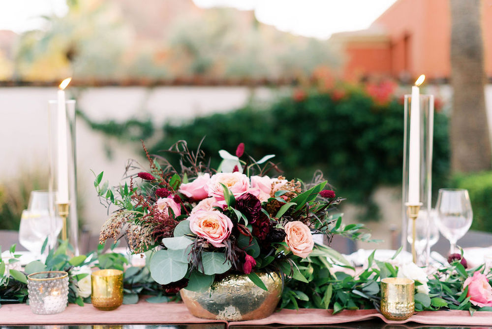 Blush and burgundy head table centerpiece at fall Omni Scottsdale wedding