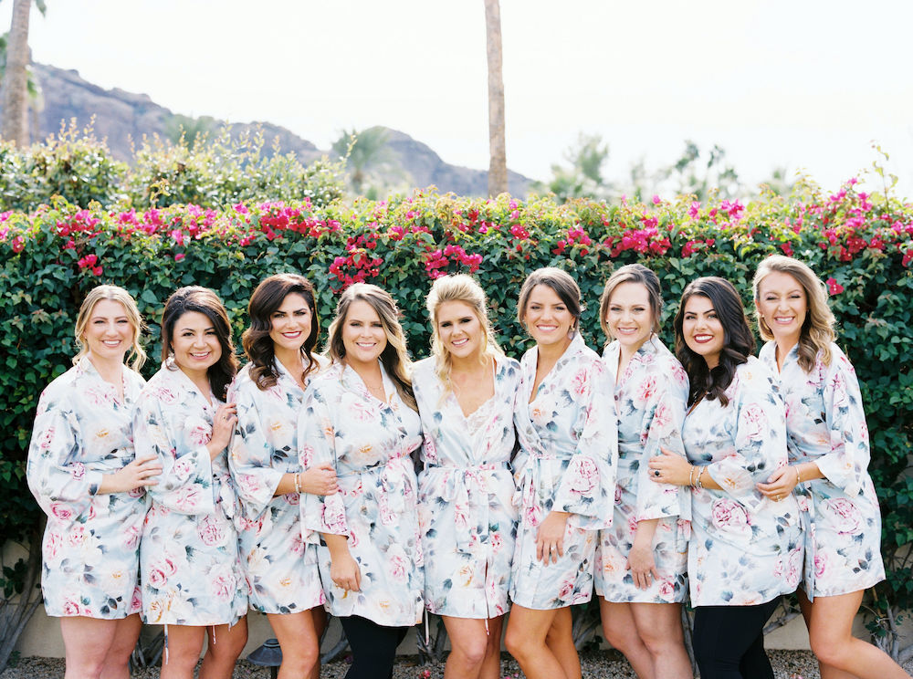 Bridesmaids in floral robes at Omni Montelucia Scottsdale.