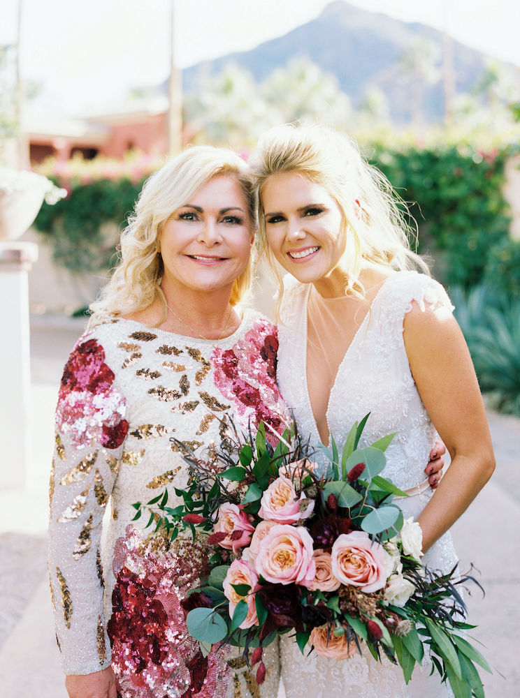 Bride with blush garden bouquet and her mom.