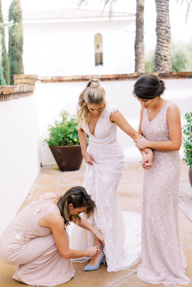 Bride and bridesmaids getting ready at camelback villa at Omni Montelucia