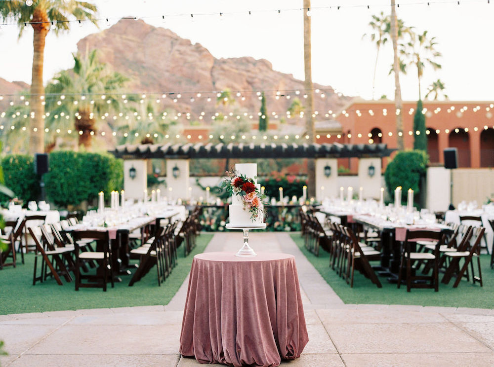 Wedding reception and cake on Valencia Lawn at Omni Montelucia in Scottsdale.