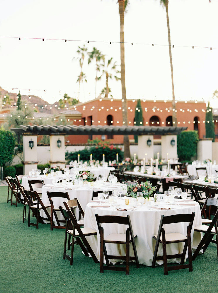 Fall Omni Scottsdale wedding reception on lawn with round tables